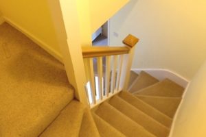 Staircase with oak handrail to loft conversion in Portsmouth