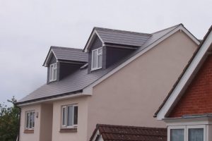 Slate dormers to loft conversion in Portsmouth. Detached house 3 bedrooms with shower room suite.