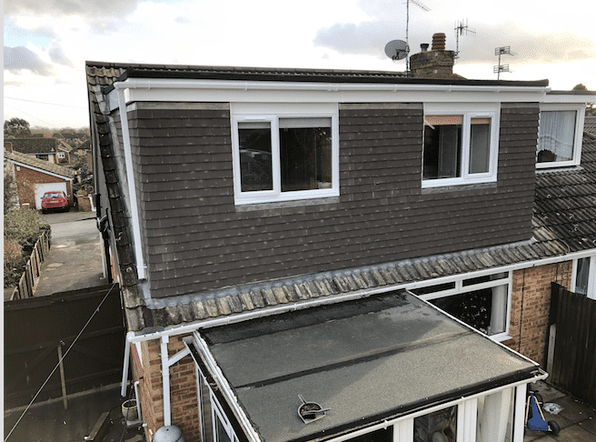 Rear elevation flat roof dormer to a bungalow loft conversion. In Portsmouth with tile hanging.