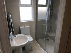 Shower suite built into a bungalow loft conversion in Portsmouth.