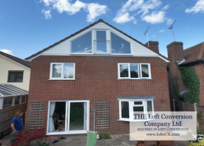 Rear elevation glass gable wall with French doors opening in. Juliet balcony with toughened safety glass. Loft conversion carried out to a very high standard in Portsmouth area.
