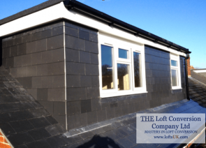 rear elevation flat roof dormer constructed with slate to a loft conversion in Portsmouth area.
